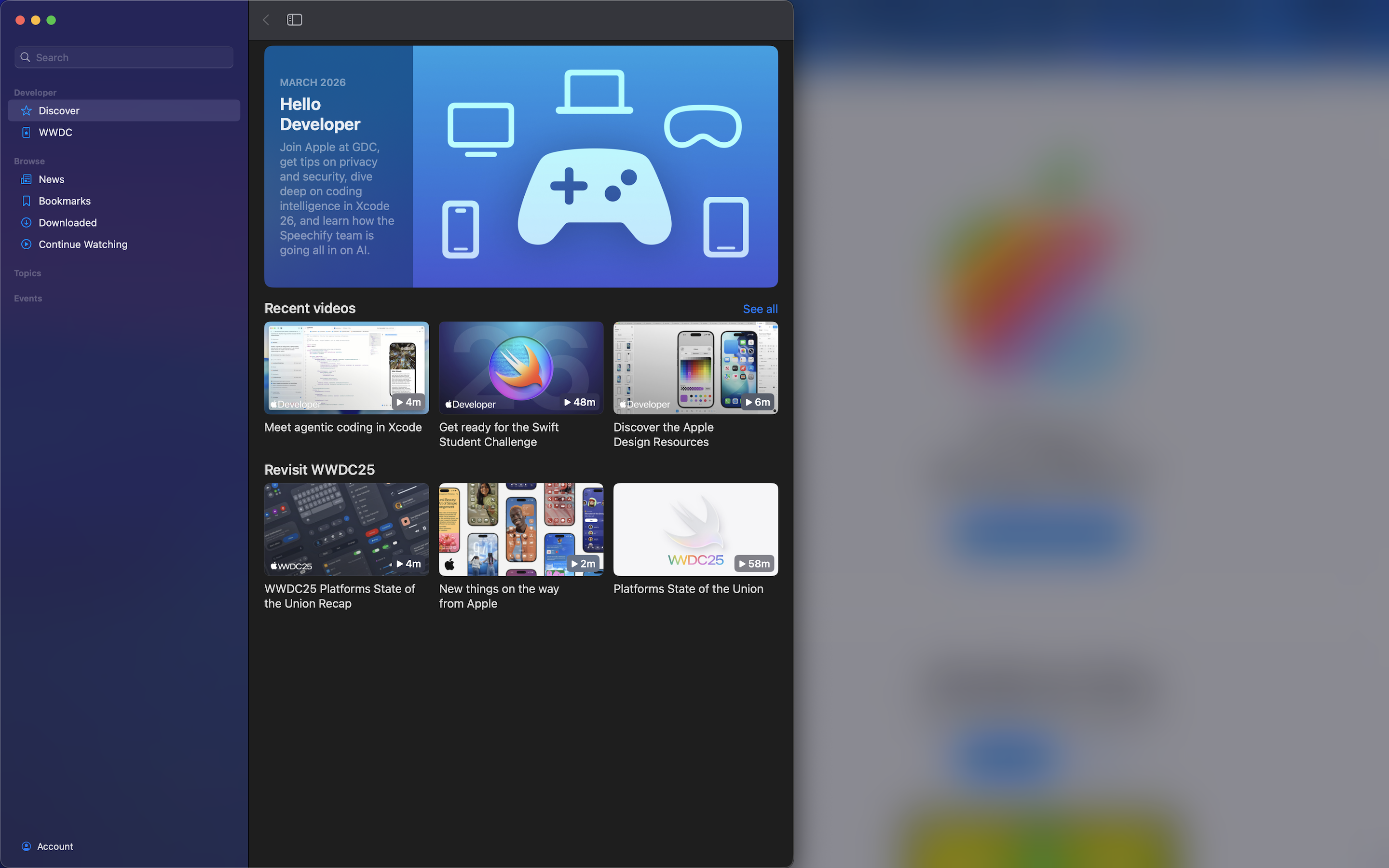 An active Apple Developer window stays clear while surrounding desktop windows are blurred